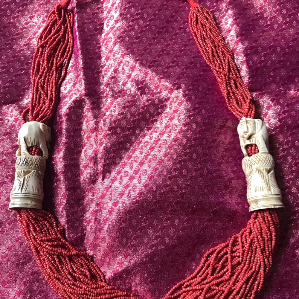 Necklace - red beads with engraved elephant horn
